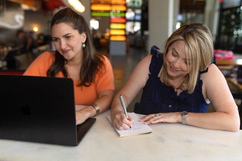 A modern creative workspace dashboard showing branded AI content tools, campaign templates, image editing panels, and automated production workflow controls for enterprise marketing teams.